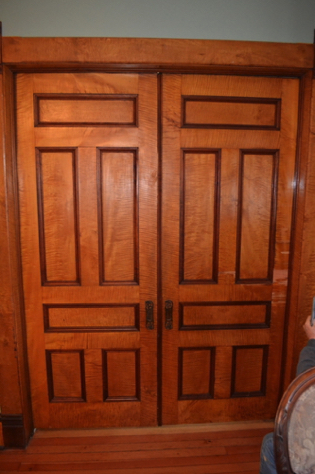 Pocket door damaged by loose bricks protruding from fireplace. Pocket door damaged by loose bricks protruding from fireplace.